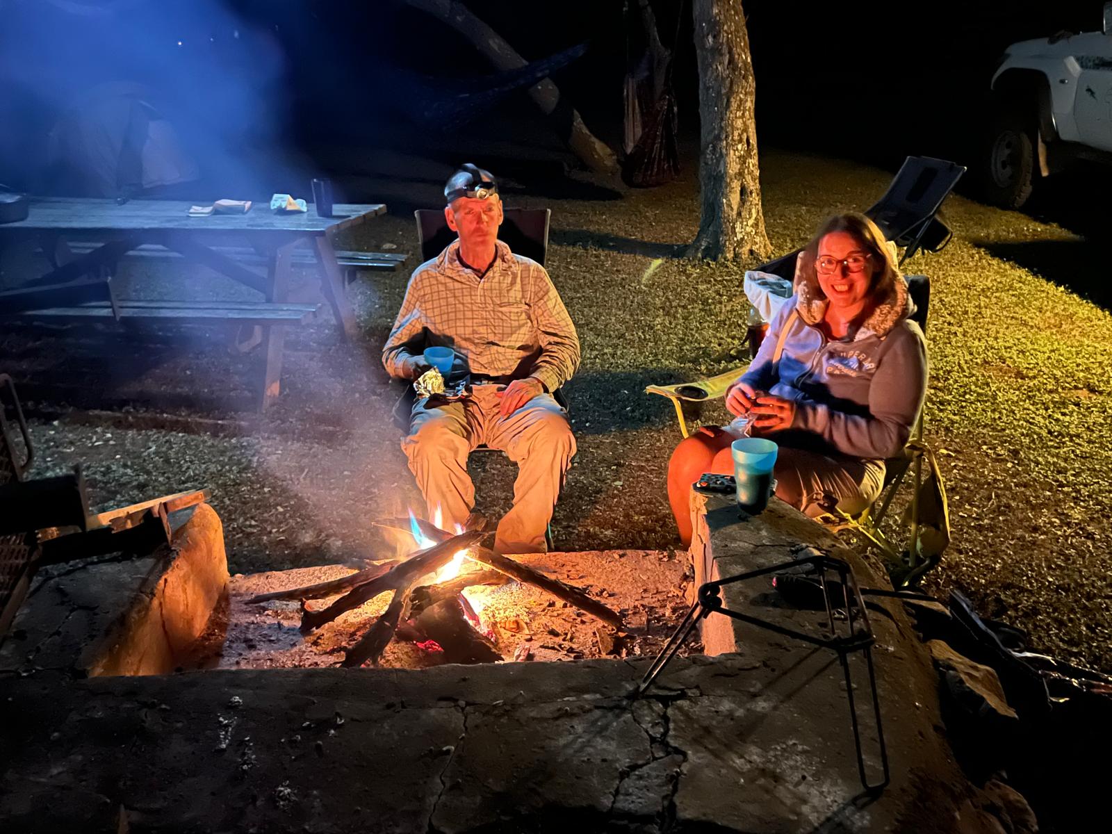 Sitting around the campfire in the evening
