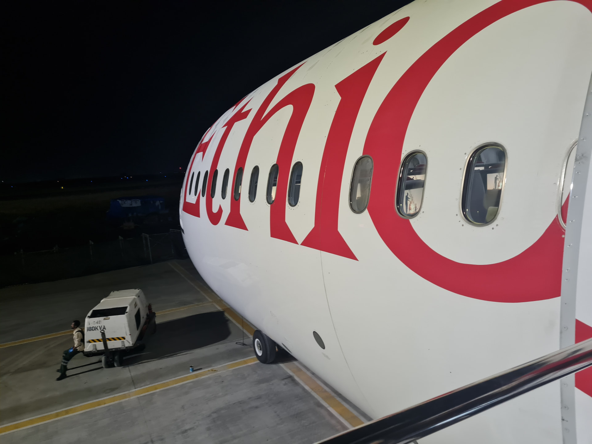 Ethiopian Airlines aircraft on the apron at night in Addis Ababa